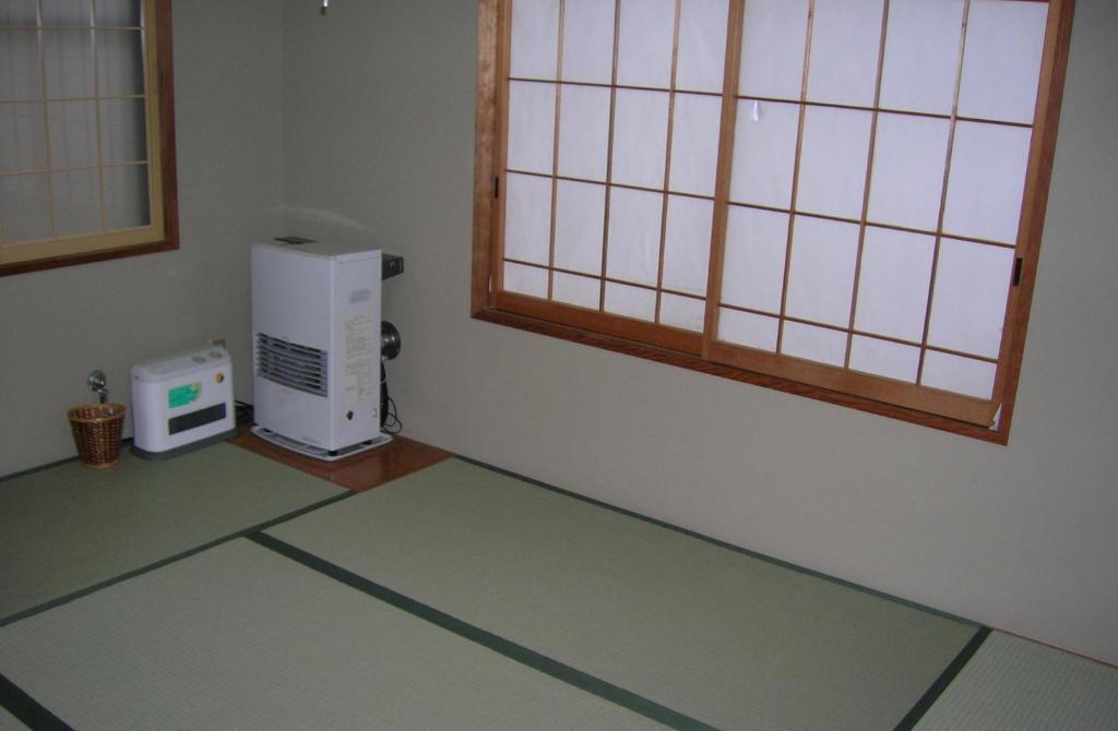 Pension & Cottage Shokubutsushi Хакуба-Мура Номер фото